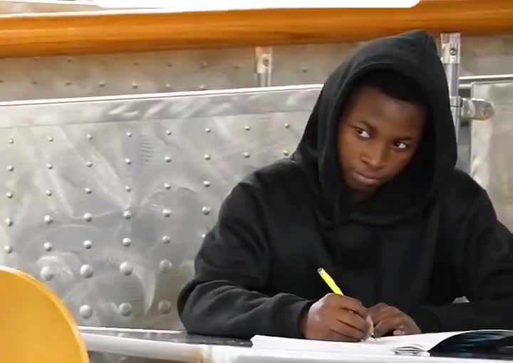 The true supervillain was sitting next to him the entire time
