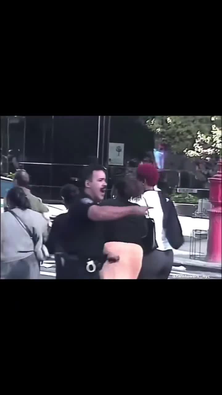Can’t believe have never seen this footage of 9/11 with people fleeing down the road.