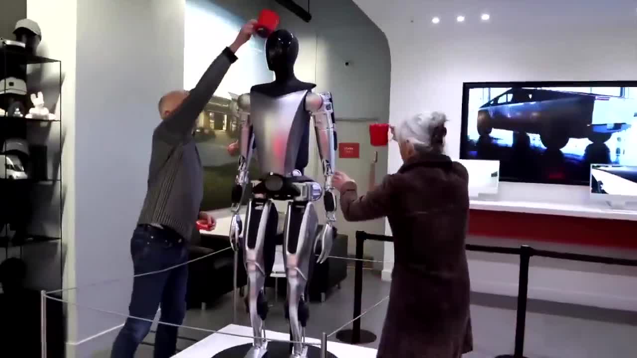 Anti-Elon nutjobs are now attacking Tesla’s Optimus robot by dumping liquid latex on it   These people have completely lost the plot 🤦‍♂️  🤡🌎 in full effect