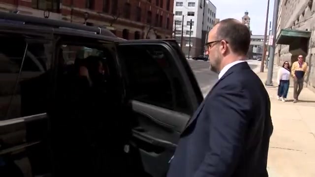 Activist Judge Hannah Dugan seen leaving the courthouse with her attorney after being arrested by the FBI this morning for interfering with an ICE raid.