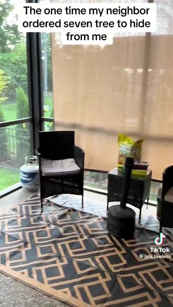 She has a privacy curtain blocking the neighbors, and she’s complaining about the neighbor putting up trees.   Not everything is about racism, ma’am.  🤦‍♂️