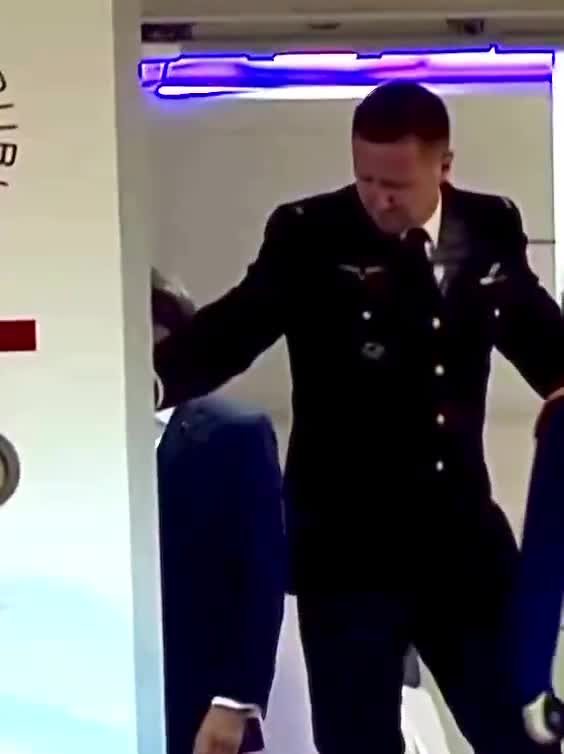 Macron, blink twice if you need help.