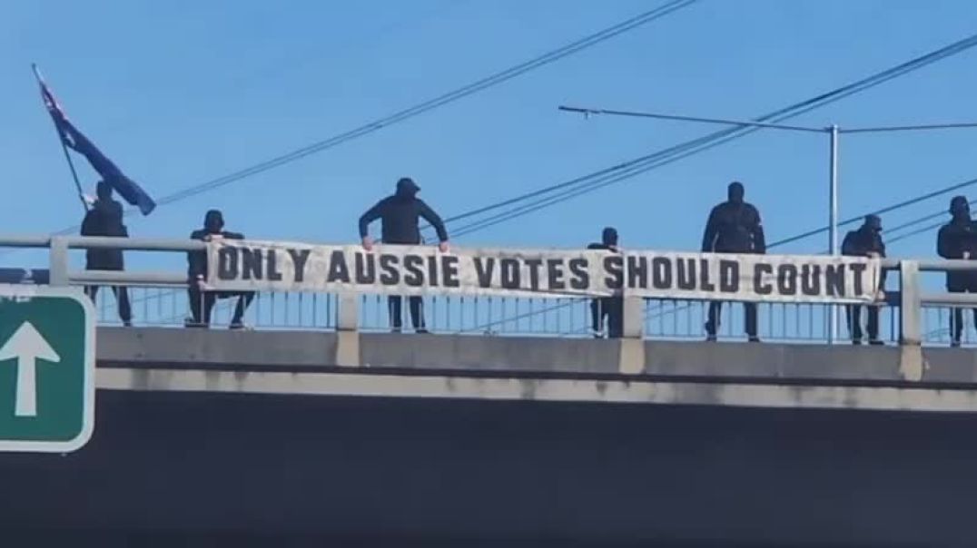 Nationalist activists protest against immigrant voting blocs with a series of banners in Melbourne on election day.  The last one says "only Aussie votes should count".