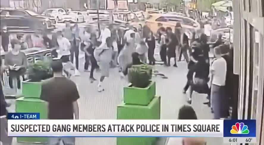 BREAKING: NYPD officers attacked by a mob of TDA illegals in Times Square as officers tried to prevent an assauIt  One is just 12 years old