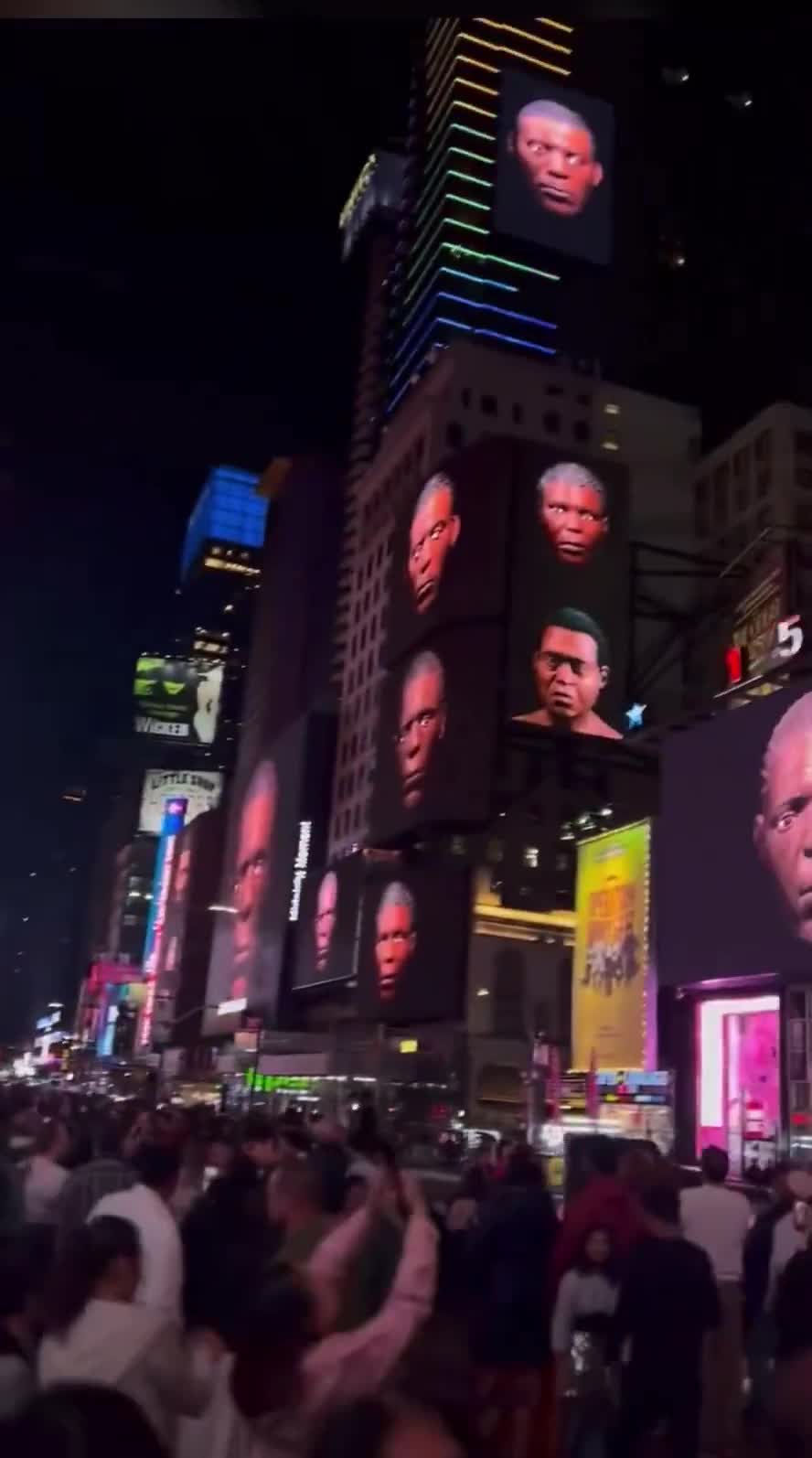 Every night of May, a black face is shown on billboards across Times Square