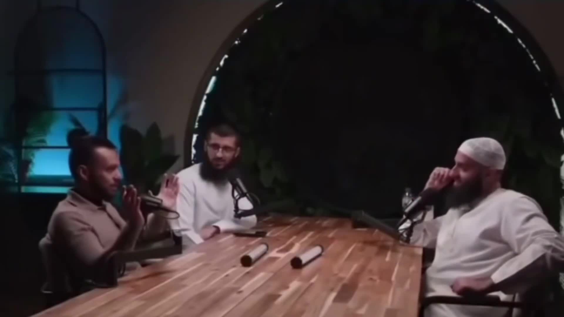 Two Muslims in Michigan discuss their plans for a development of several hundred houses, with plans to keep non-Muslims out by routing almost all HOA fees to a mosque. They talk about naming...