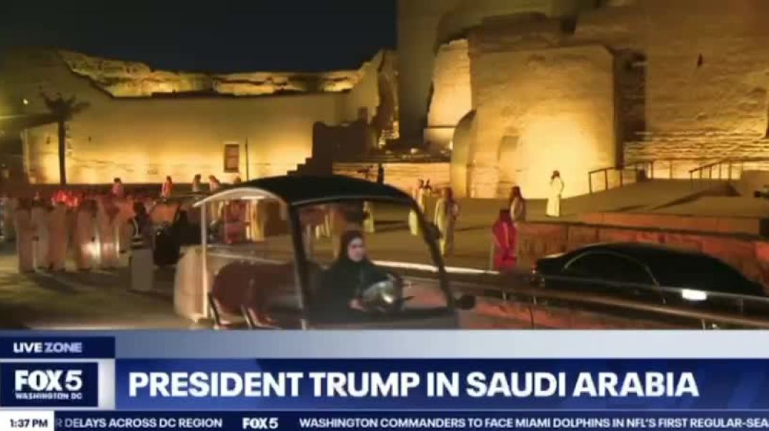 President Trump has arrived in a golf cart and it sounds like sword, dance music playing