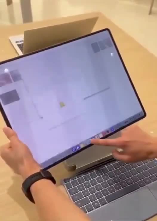 Huawei just dropped its first foldable laptop at only 7.3mm thick when unfolded   The MateBook Fold starting at $3300 exclusively in China