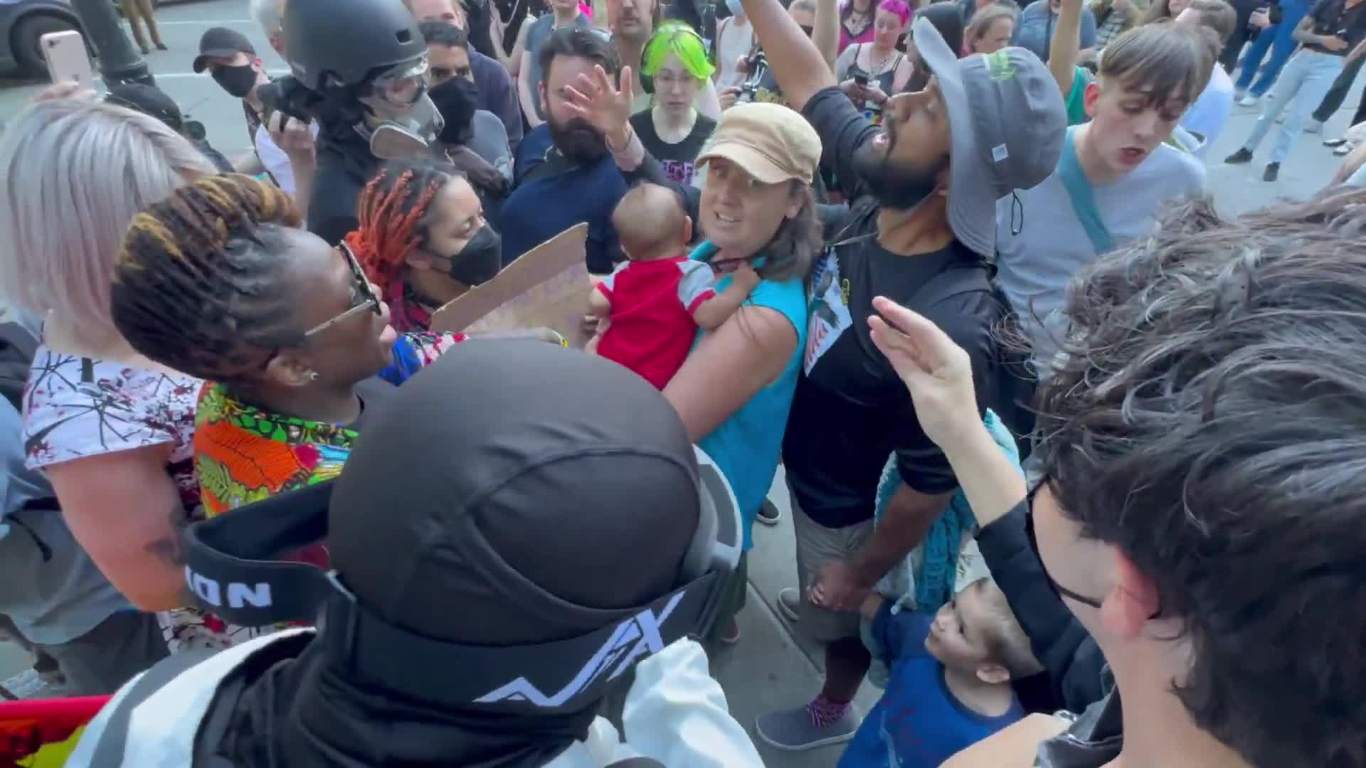 Protestors in Seattle surrounded a mom and her toddler as she tried to attend a Christian event   Why does the left hate Christians so much?