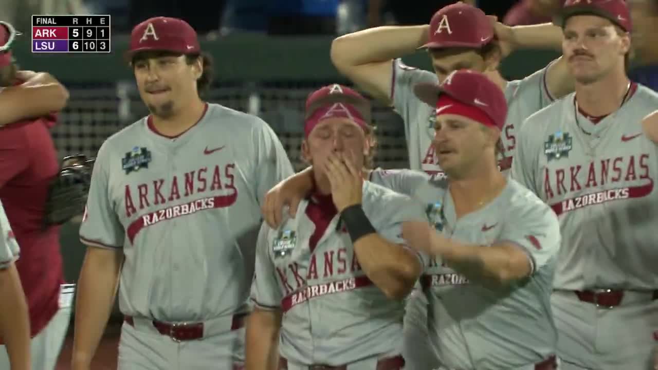 Arkansas players consoling each other after losing to LSU in the MCWS ❤️