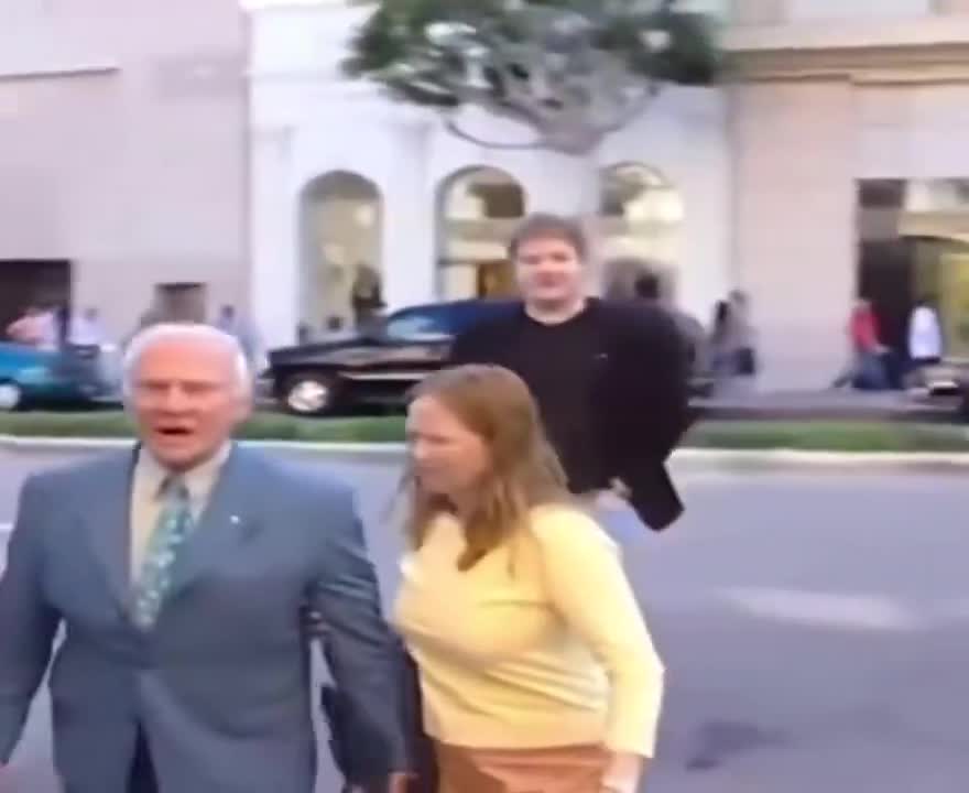 Buzz Aldrin punches a conspiracy theorist after being accused of faking the moon landing (2002)