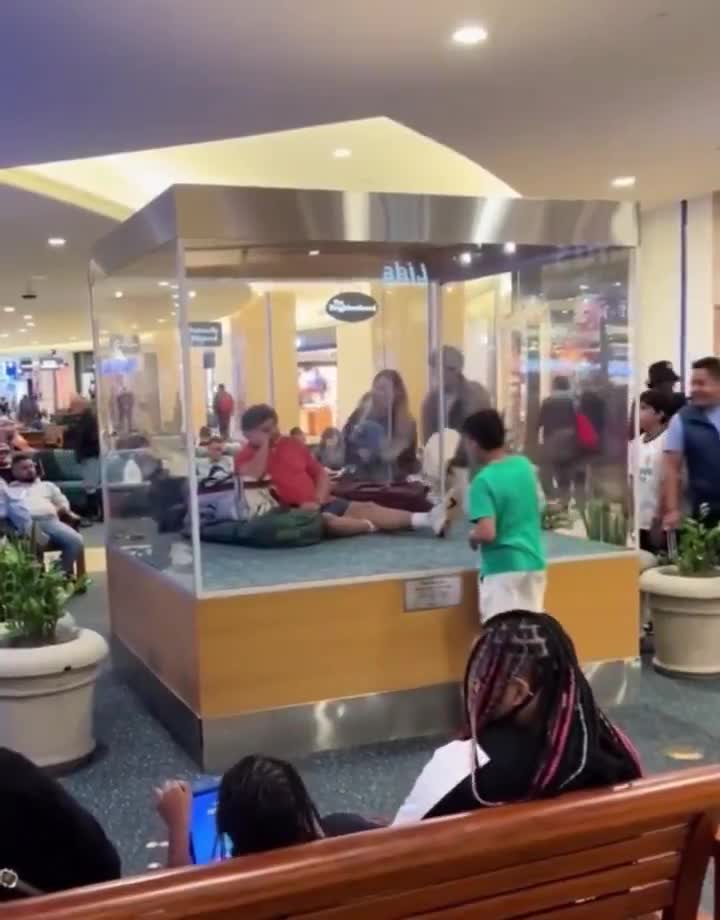 Statue of a sleeping man in Orlando International Airport  Titled “The Traveler”, this hyper realistic statue has been there since 1986