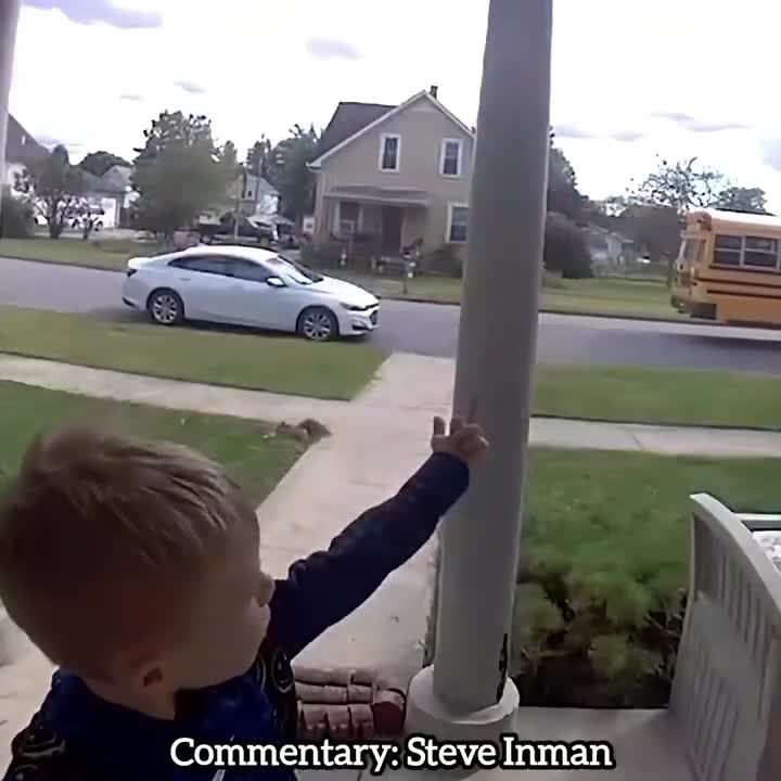 Tommy waves goodbye to his classmates.