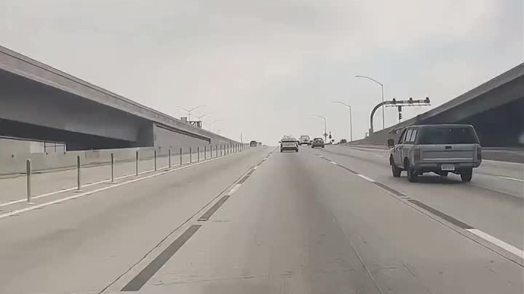 Man driving on the 110 in Los Angeles is amazed by how few cars are on the road.  He says, “You know what Trump? It’s working brother.”