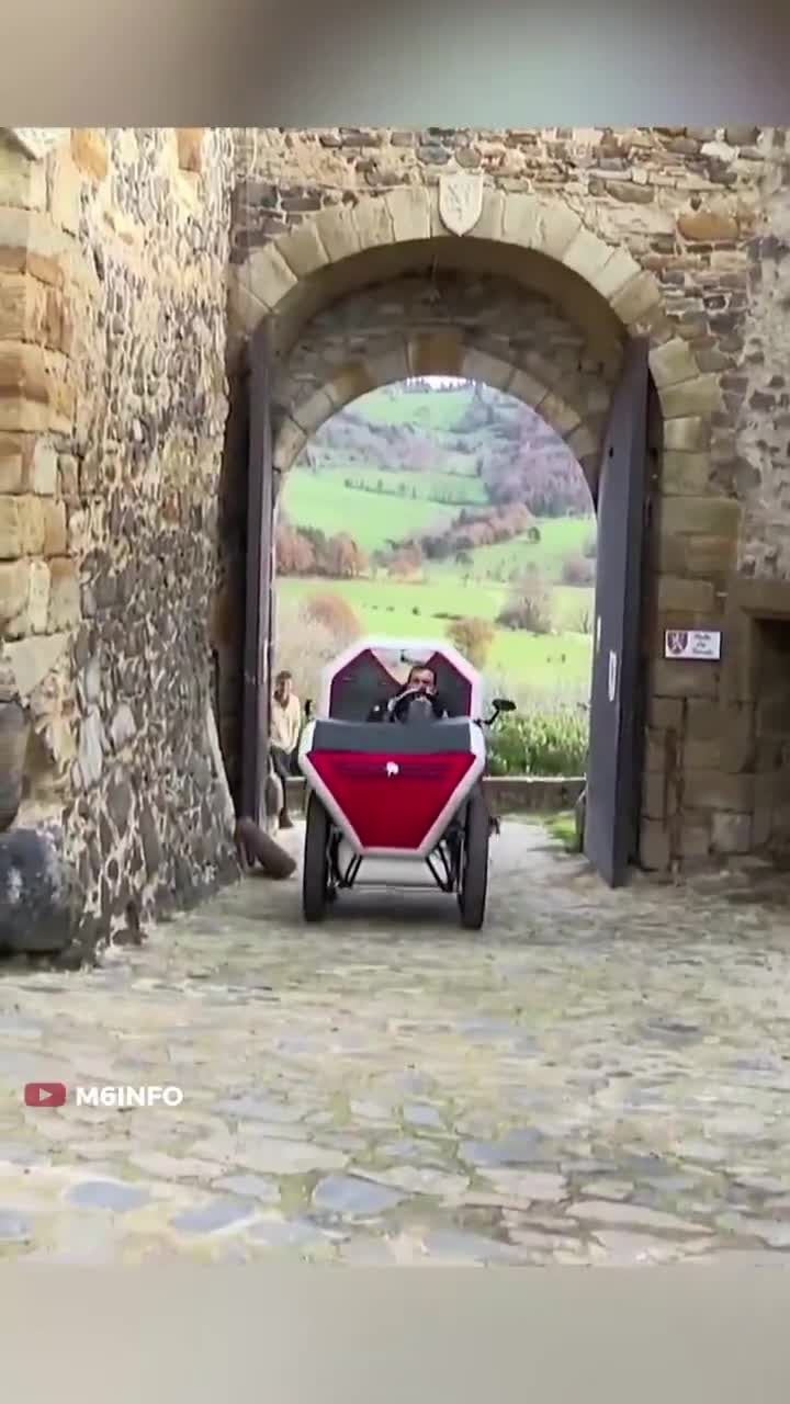 🇫🇷🇯🇵 THIS CAR-IN-A-BAG GOES 15 MPH AND FLOATS  The AIRNAM is a French-Japanese invention that's part car, part bike, part inflatable pool toy.  It rides on a paddleboard, uses bi...