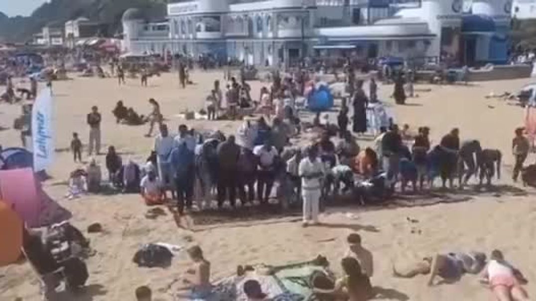 Bournemouth beach.  Call it what it is...  An invasion, these people are praying to an Islamic God openly to intimidate  in a show of force, when we have built them Mosques.