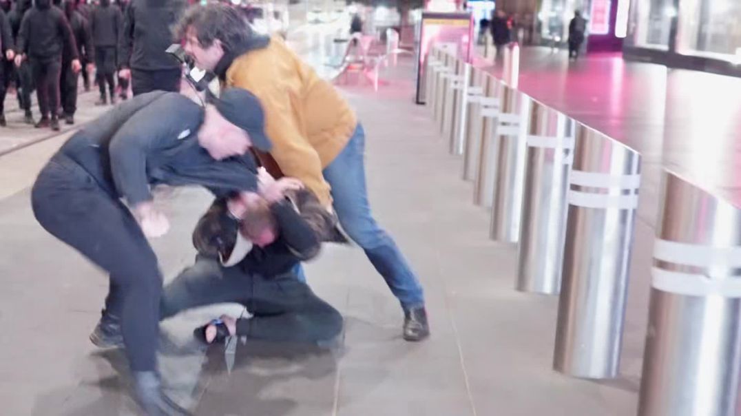 New video shows the moment an aggressive homeless man attacks demonstration leader Thomas Sewell during the National Socialist Network's march through Melbourne.