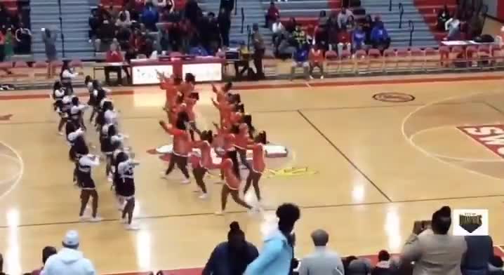 Halftime turned into a full-on cheer squad brawl 😳🏀