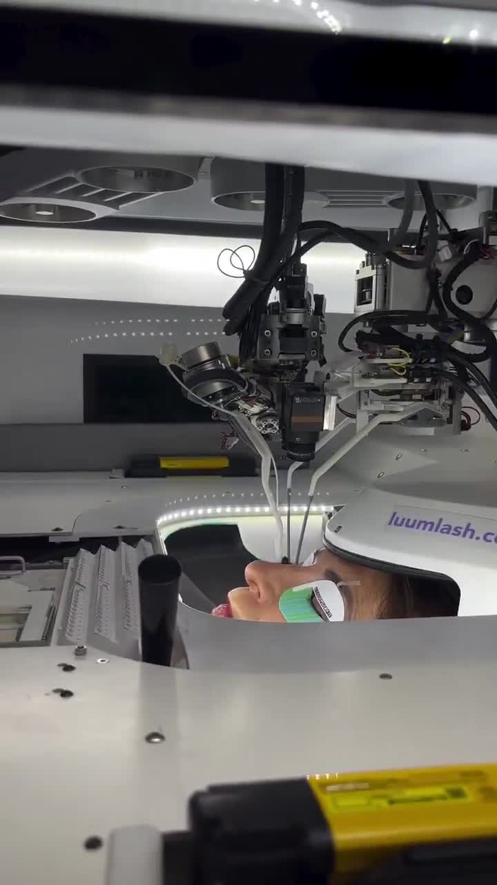 ROBOTS ARE NOW GIVING PEOPLE EYELASH EXTENSIONS  This machine can apply perfect lashes while you just lay there blinking like a confused goldfish.  It’s like a sci-fi beauty salon where th...