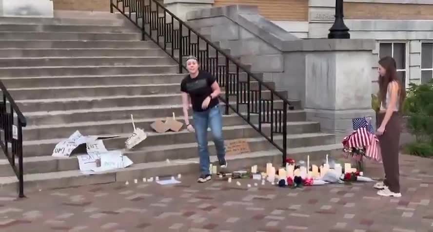 Leftist destroys a Charlie Kirk memorial in front of a Court House in Bentonville, Arkansas.   These people are straight up evil