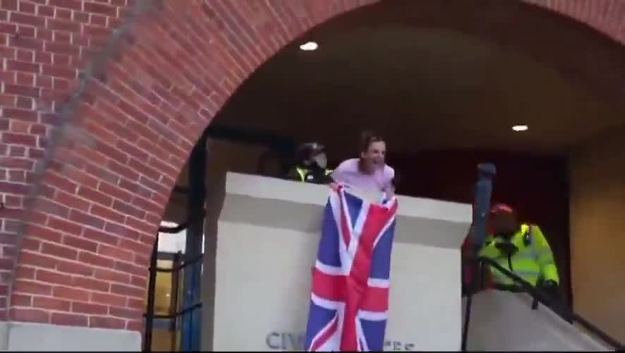 BREAKING TYRANNY ALERT: A woman has been arrested for flying a British flag at Epping council building.  Britain is an anti European/Western globalist police state and MUST be LIBERATED!!!