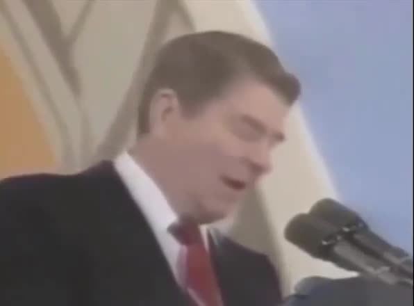 Ronald Reagan reacting to the popping of a balloon during a speech in 1987