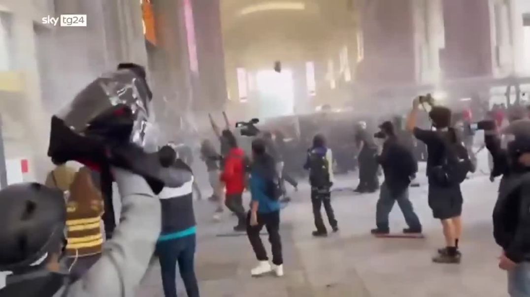 🚨 NOW— Chaos in Italy: Antifa Clashes with Police at Milan Train Station Over Remigration Summit