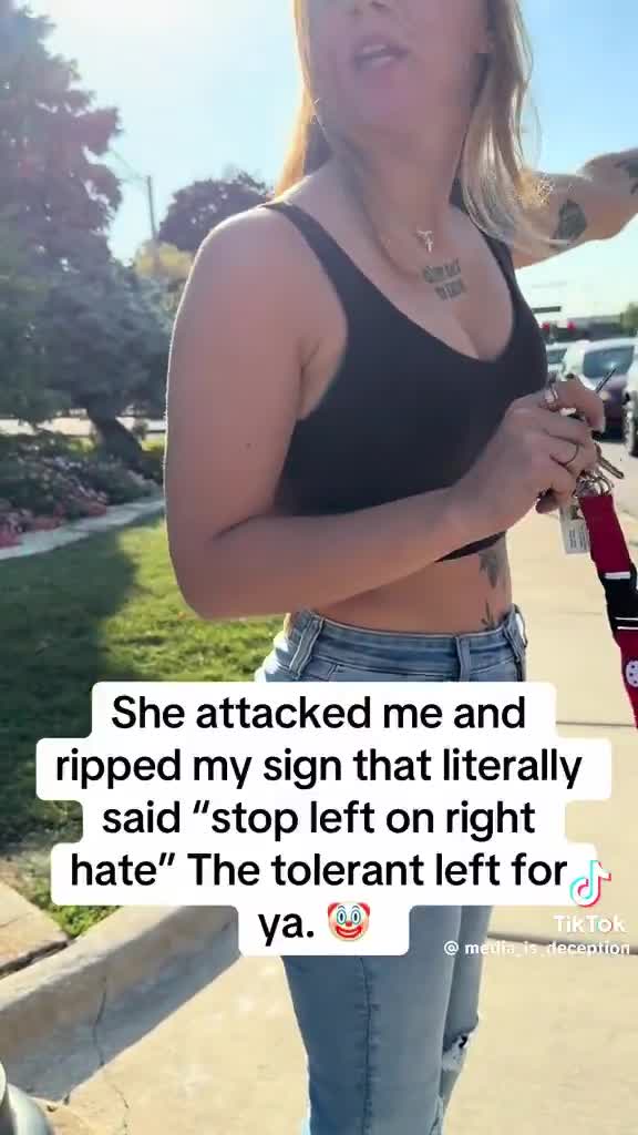 Woman attacked for holding a ‘Stop Left on Right Hate’ sign Why are they so angry?
