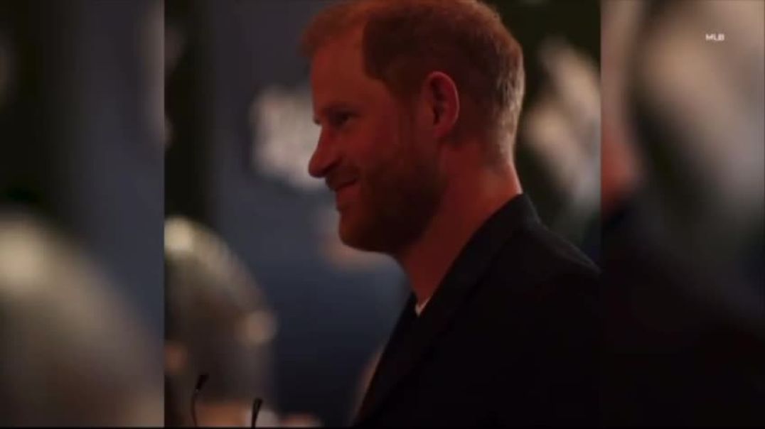 Harry and Meghan were filmed smiling as they appeared to be booed by crowds at a World Series baseball game.