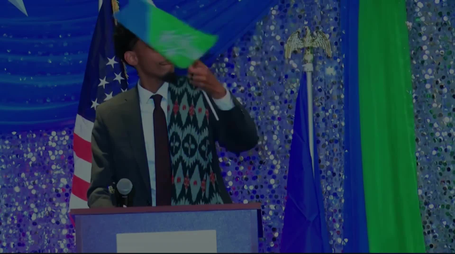 Omar Fateh waves foreign flag, speaks a foreign language, pledges his loyalty to Somalia, tells Somalians to elect him  This is a rally in Minneapolis