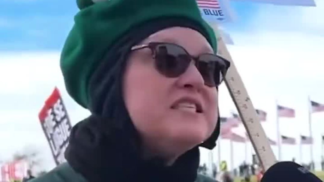 Anti-Trump protester says President Trump is taking away her right to protest.  She says this as she’s protesting.