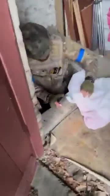 Bellator fighter recovers his belt from his home that was bombed in U...