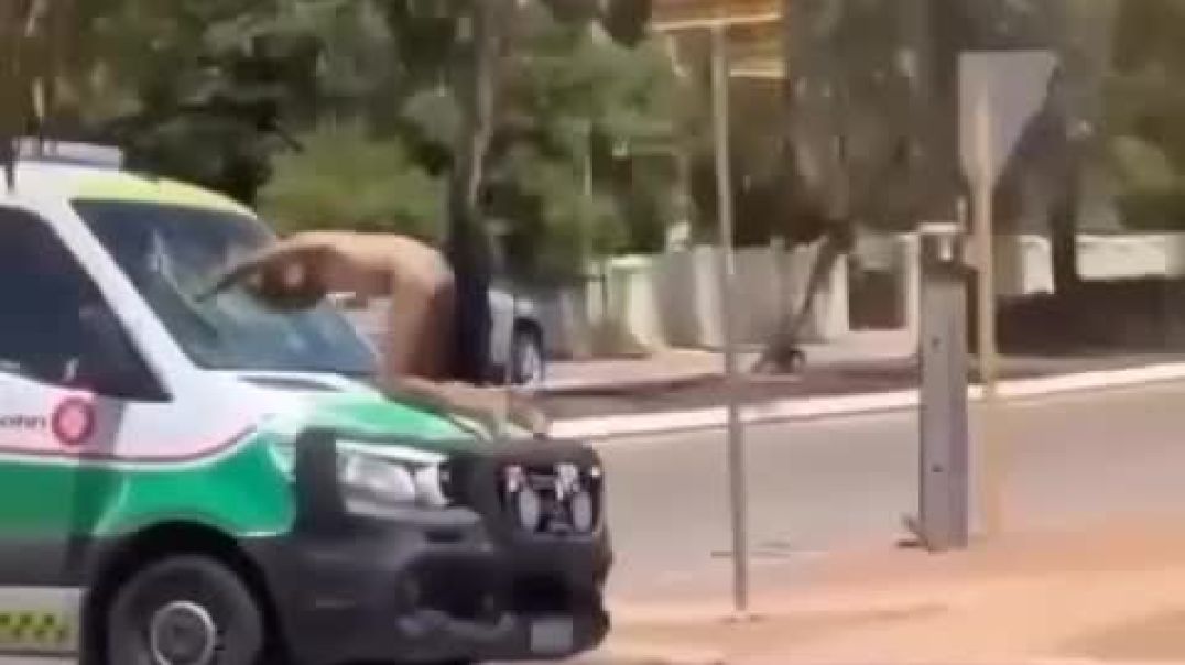 Naked maniac smashes ambulance windscreen with his head in Kalgoorlie, Western Australia.