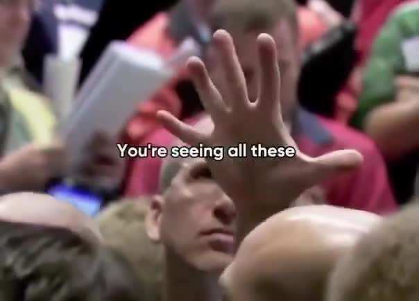 Explaining Wall Street's chaotic hand signals