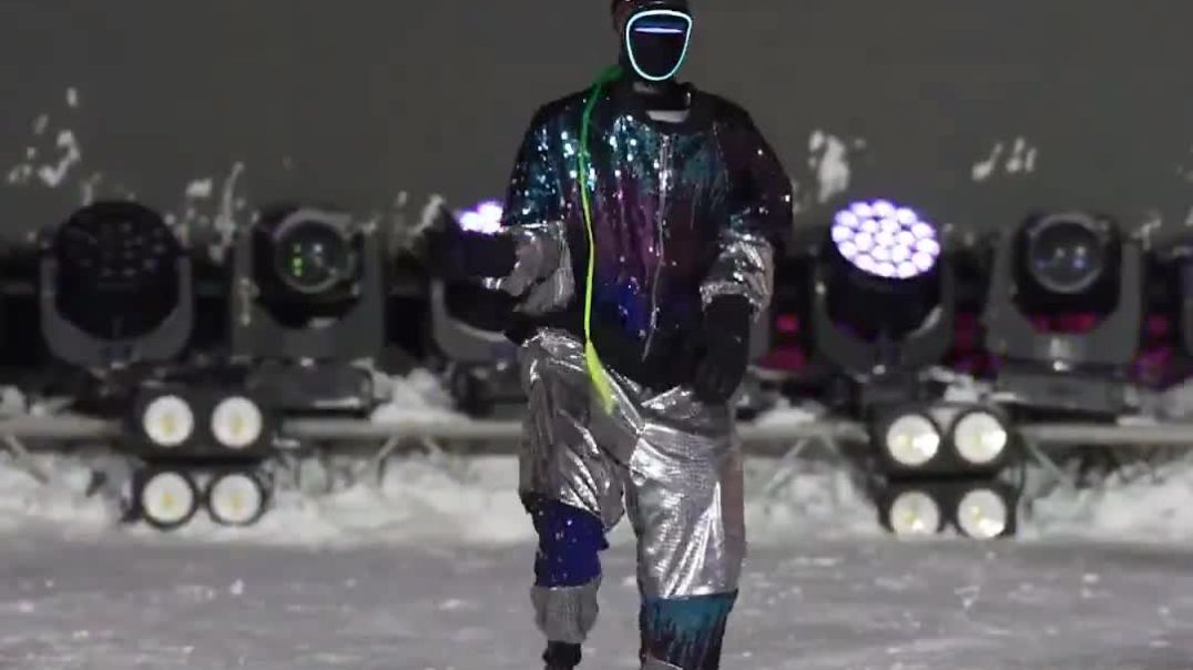 Humanoid robots showcase their IMPRESSIVE choreography on a snowy stage at Harbin Ice-Snow World in China