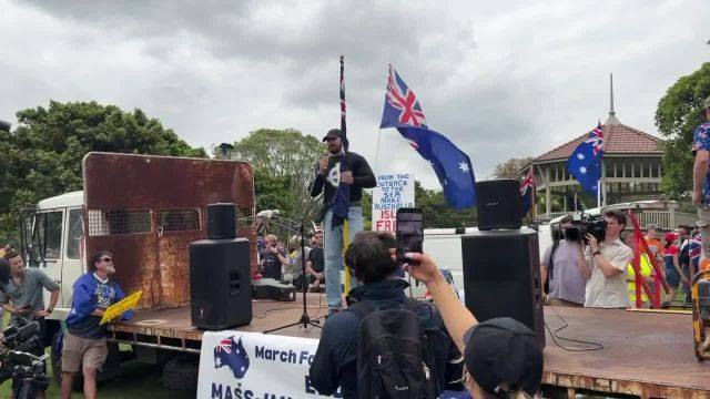 Open mic speaker at the Sydney March for Australia rally says the Jewish lobby was behind new hate speech laws, and shouts "free Joel Davis, hail White Australia, hail Thomas Sewell".  He was arrested while leaving the rally for "inciting racial hatred".