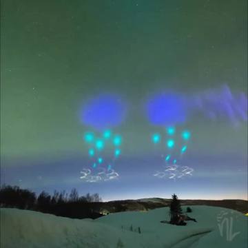 Filmed via a Webcam - this clip is 100% Authentic. NASA Commented stating it was just rockets being fired over the Arctic creating this effect….. Truth is stranger than Fiction.