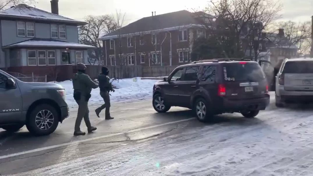 This appears to be a video of the shooting in Minnesota.  - Lady blocks in ICE Vehicles.  - ICE agents order her out. - Woman hits the gas and drives at the ICE agent in front of her.  - Agent open fires