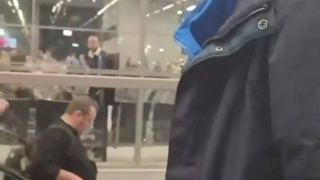 'This is Poland. Go back to Israel' — Polish man heckles Hasidic Jews to stop praying at the airport  'Why your country no democrat? You come in my country democrat'