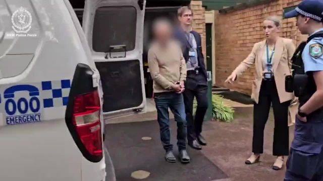 A sixth Sydney man has been arrested over an alleged international satanic paedophile ring, and 145 foreign suspects identified.  An ex-cop, a far-left journalist and a swim coach are among those previously charged.