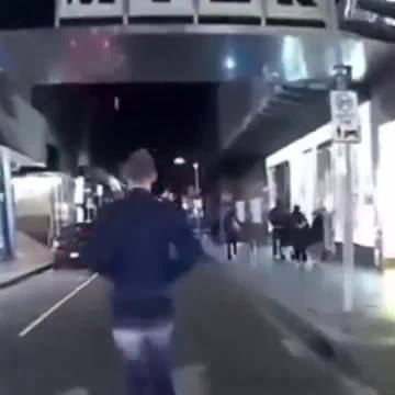 Hero removes trash from the street.